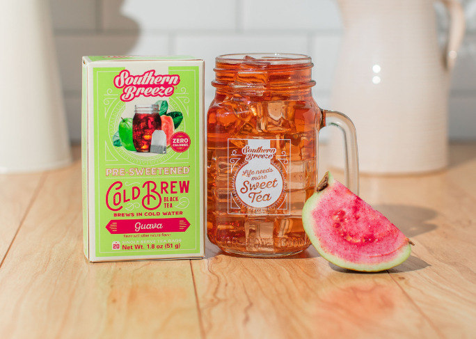 Southern Breeze Guava Cold Brew Sweet Tea, with mason jar of tea and fresh guava