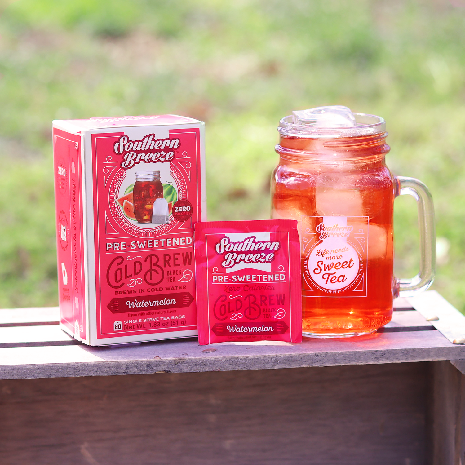 Southern Breeze Cold Brew Watermelon Iced Tea Carton pack alongside an iced tea jar and tea bag