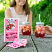 Southern Breeze Raspberry Sweet Iced Tea with two iced tea jars