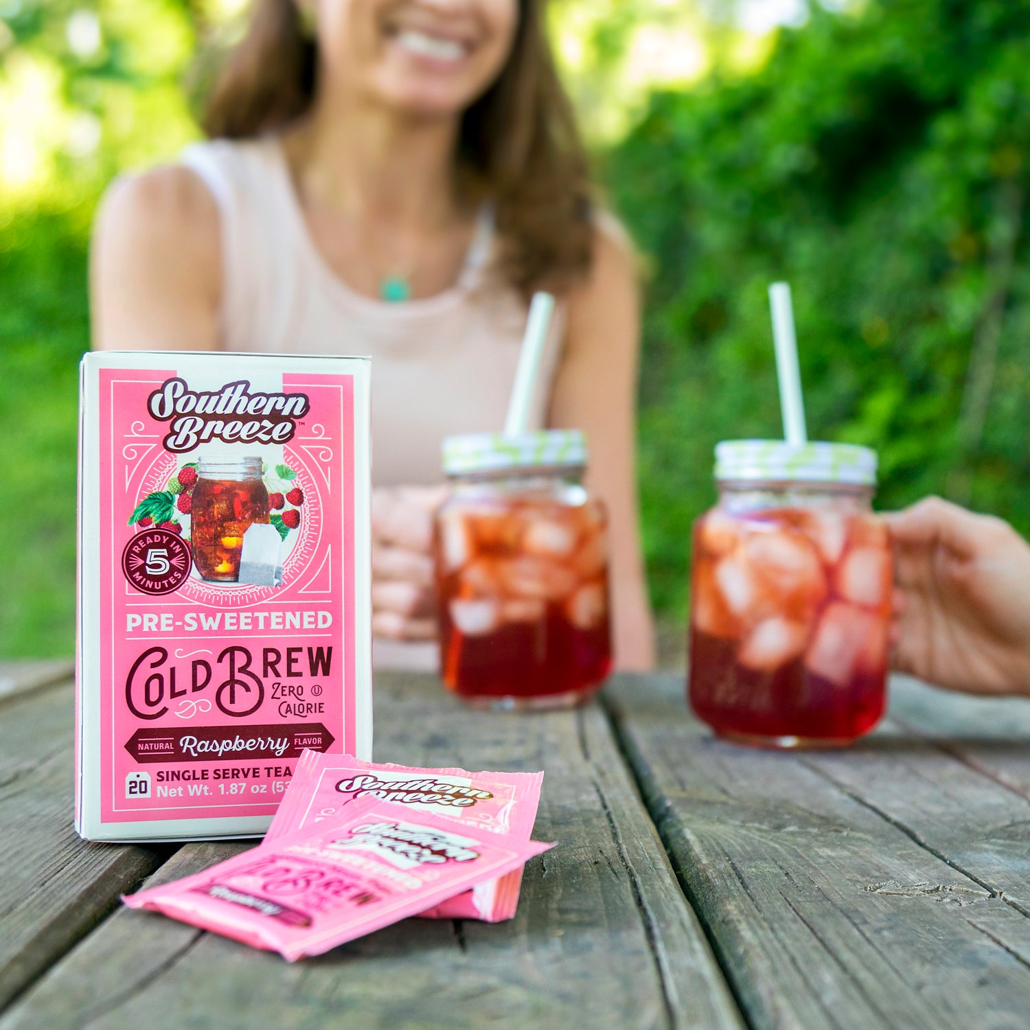 Southern Breeze Raspberry Sweet Iced Tea with two iced tea jars
