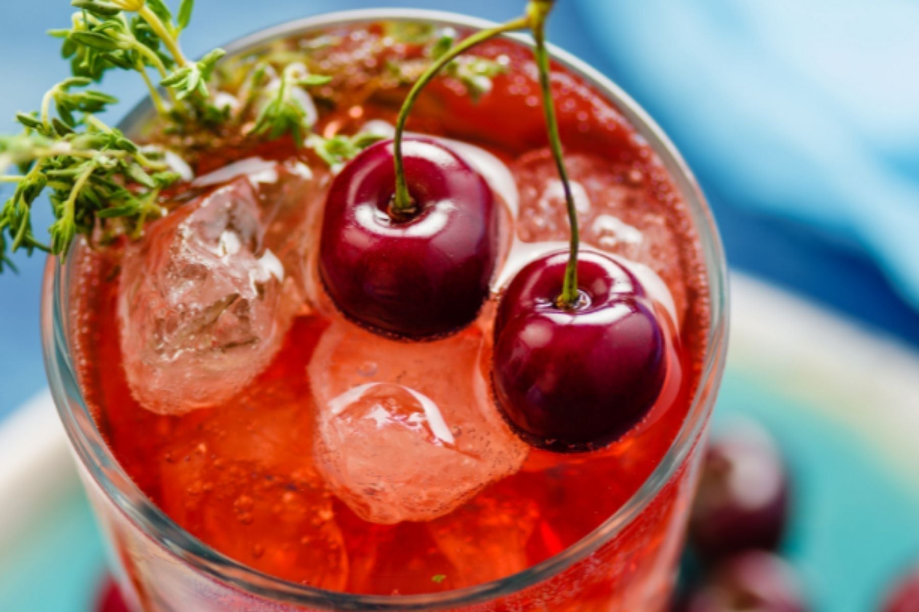 Cherry Sweet Iced Tea on a glass with cherry on top