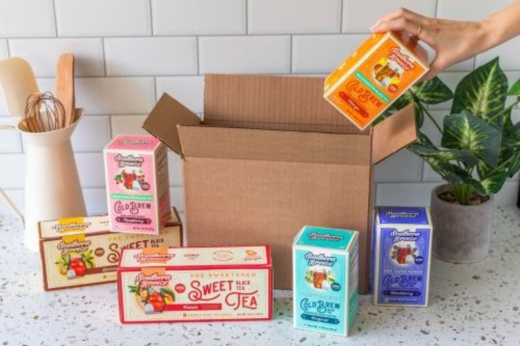 Southern Breeze Sweet Tea blends being taken out of a carton