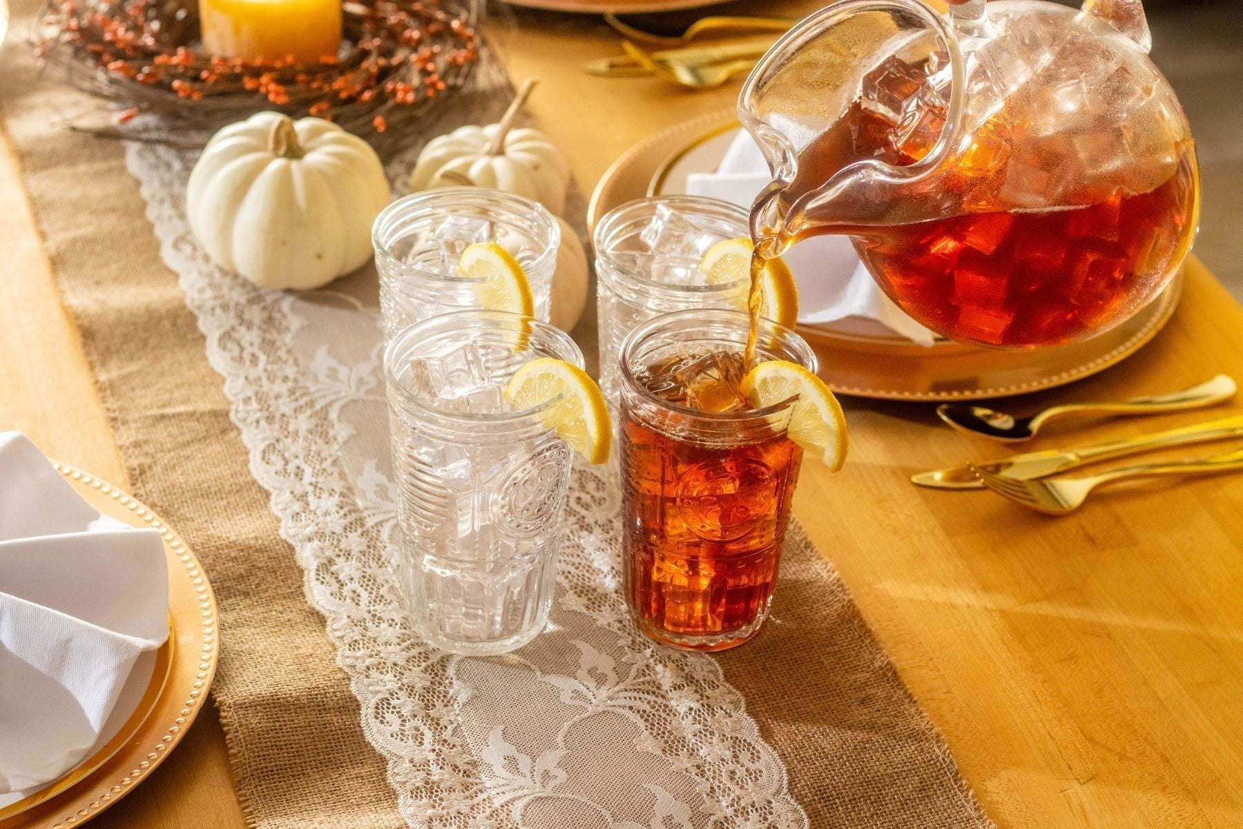 Southern Breeze Iced Tea being poured into a glass from a pitcher