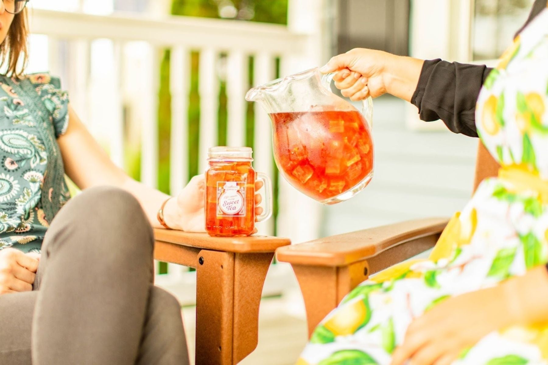 Peach Iced Tea being poured in an iced tea jar