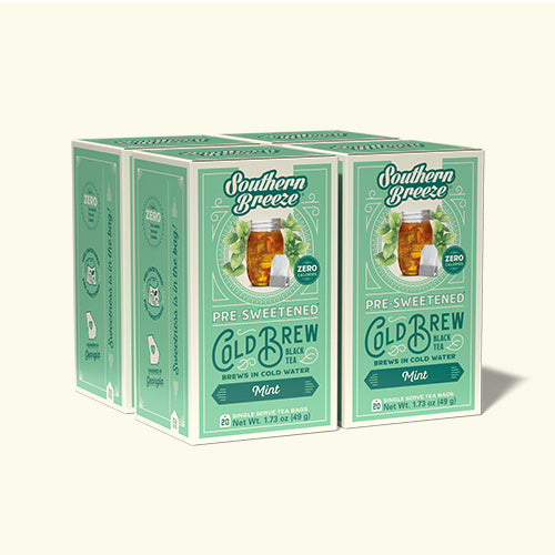 Four boxes of Southern Breeze pre-sweetened cold brew black tea with mint flavor on a white background.