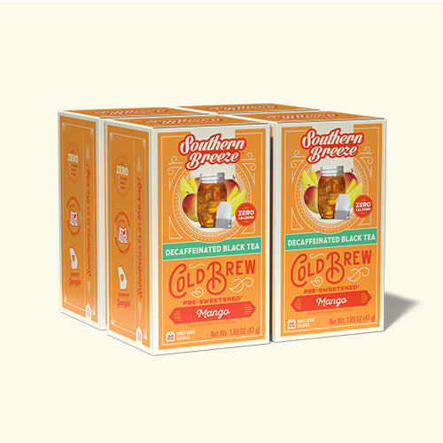 Four boxes of Southern Breeze Cold Brew Decaffeinated Mango Black Tea on a white background