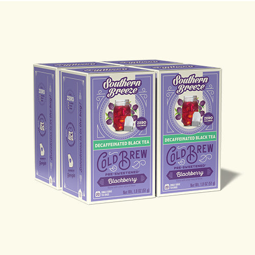 Four boxes of Southern Breeze Cold Brew Blackberry Decaffeinated Black Tea on a white background