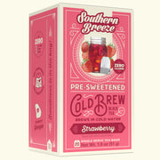 Pink box of Southern Breeze Strawberry pre-sweetened cold brew black tea on a white background