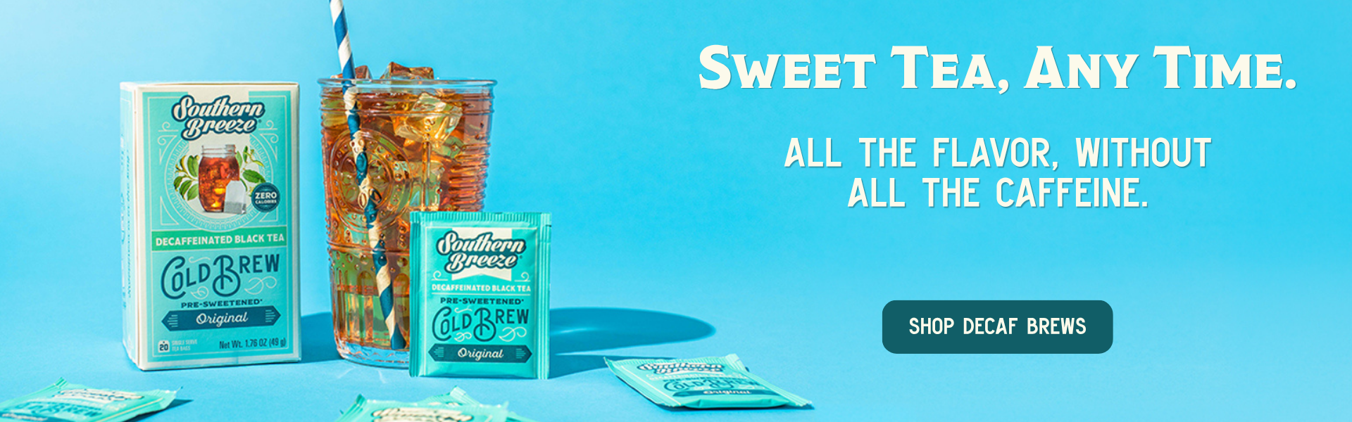 Southern Breeze Decaf Cold Brew tea packaging on a bright blue background, including a box, a tall glass of iced tea with a straw, a small tea envelope, and a few loose packets. Large text reads 'SWEET TEA, ANY TIME.
