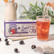 Southern Breeze pre-sweetened blackberry sweet tea packaging with a glass of tea being poured.