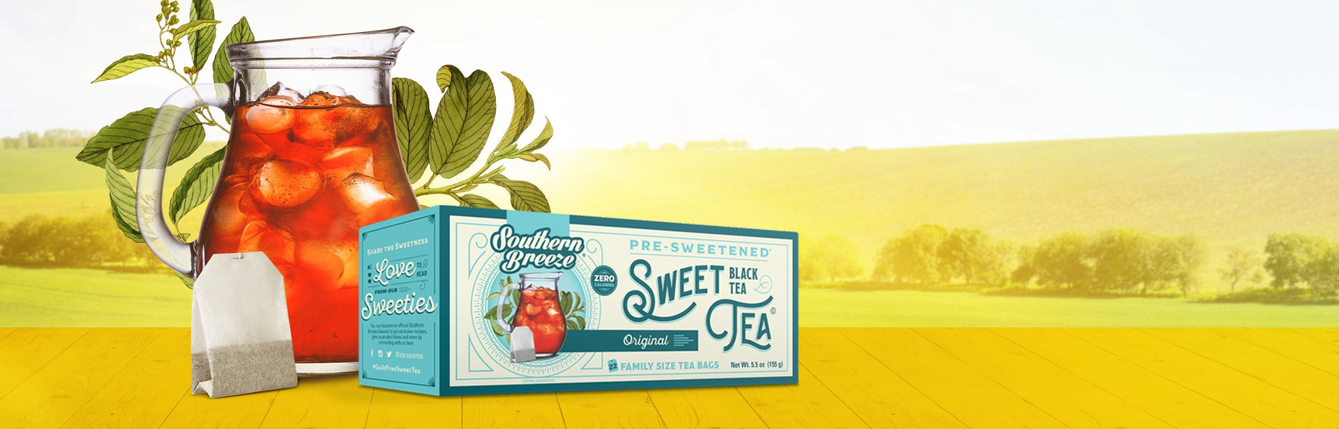 original sweet tea family size pack with pitcher of tea and tea bag and sunny farm landscape background